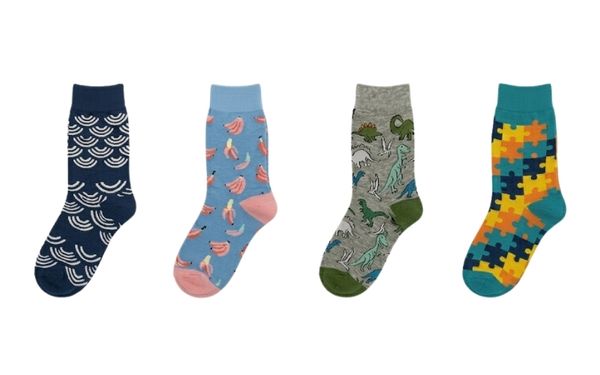 Four colourful crew socks with wave, banana, dinosaur and puzzle prints Four colourful crew socks with wave, banana, dinosaur and puzzle prints — oFashion