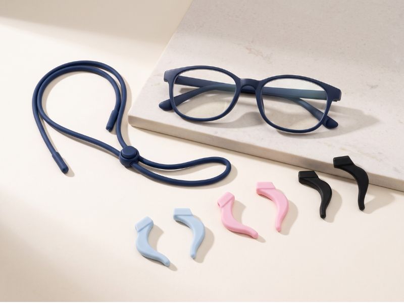 Clear glasses fitted with a black adjustable glasses cord